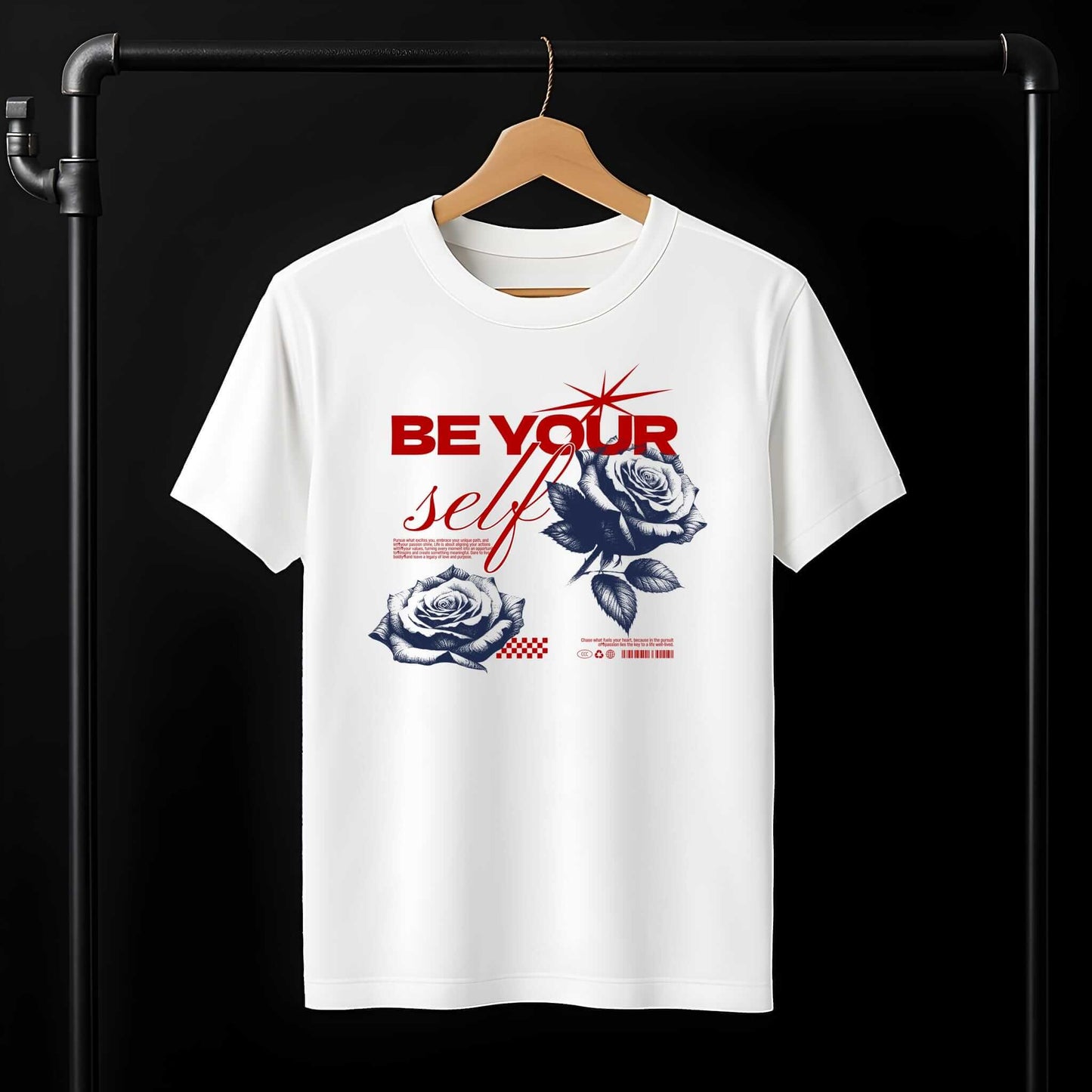 "Be Yourself" motivational text in red with elegant blue-scale roses and decorative accents on the white t-shirt.