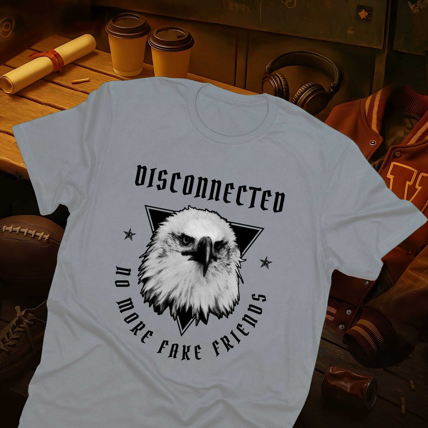 Bold eagle design inside triangle shape with "DISCONNECTED" top text and "NO MORE FAKE FRIENDS" bottom text on gray t-shirt