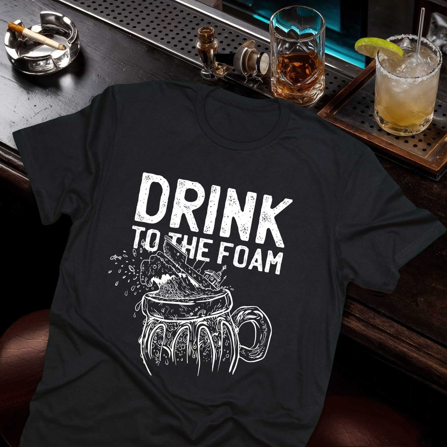 Vice and Tees' "Drink to the Foam" design with white distressed lettering and a classic beer mug sketch on the black t-shirt