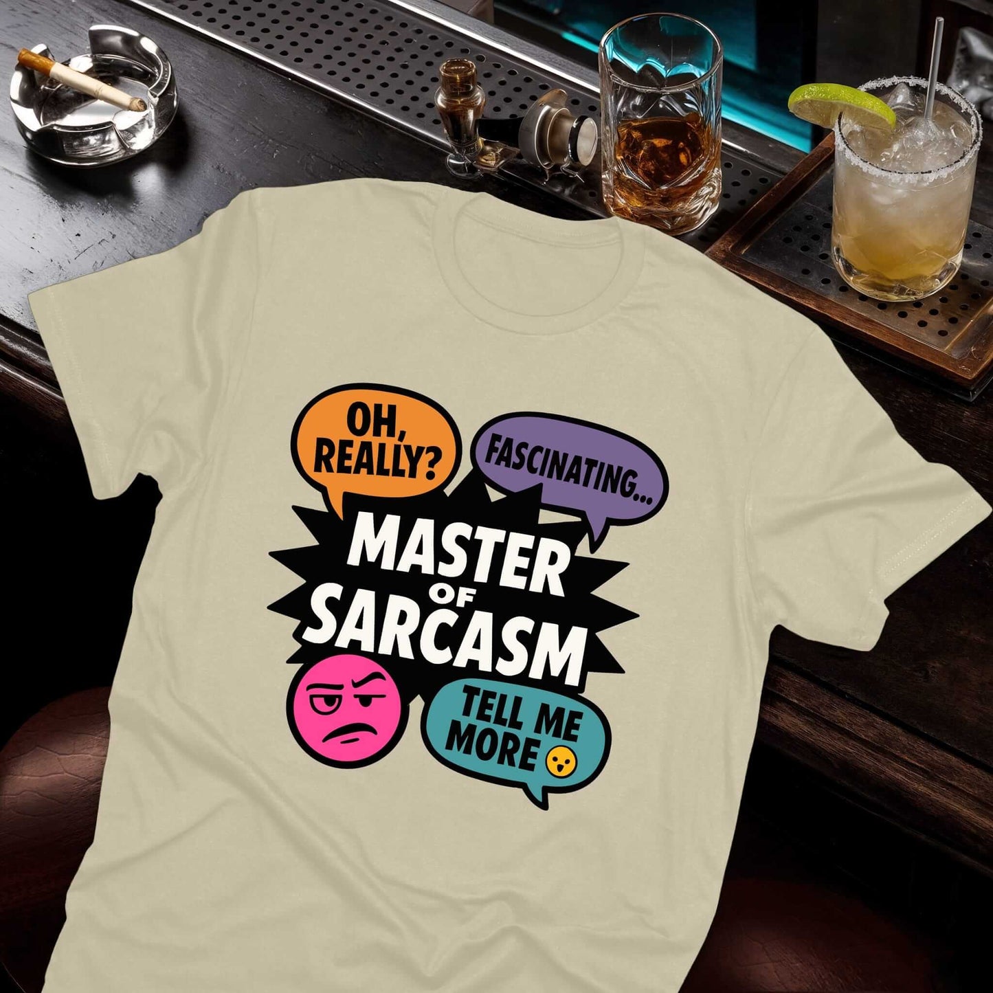 Sassy statement beige t-shirt with burst design containing sarcastic quotes "Tell Me More" and "Oh Really?" and attitude face
