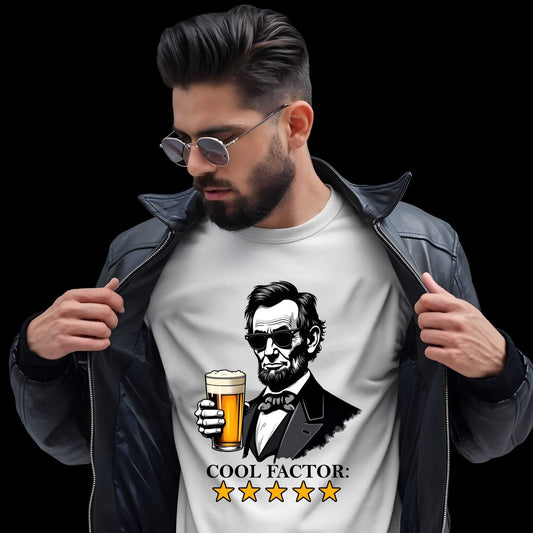 Abraham Lincoln wearing sunglasses holding a beer glass with "COOL FACTOR" text and 5 gold stars below, Vice and Tees design