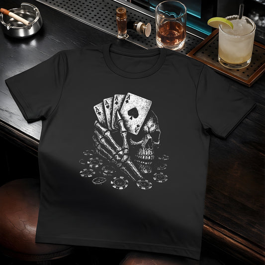 Black t-shirt featuring a white skull with crossed playing cards (aces), poker chips, and scattered casino elements.