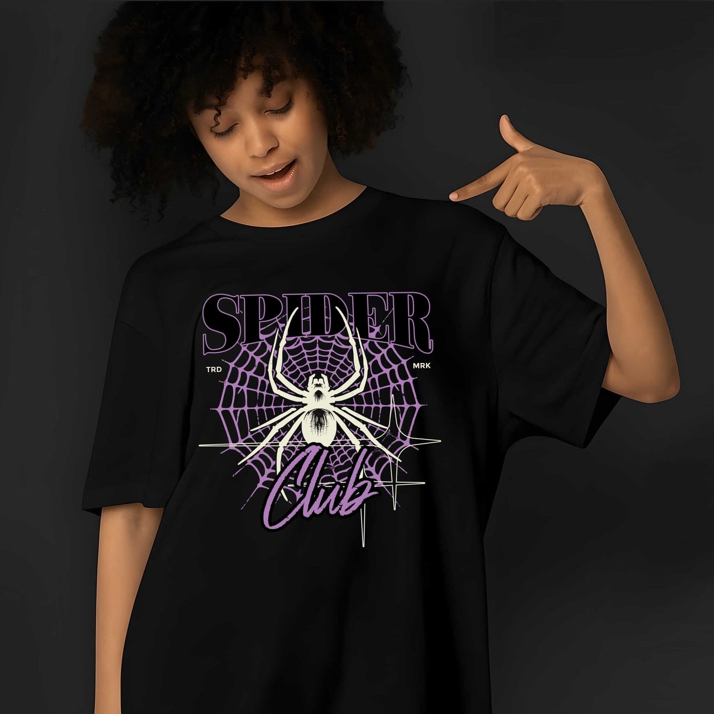 A white spider silhouette centered in vibrant purple geometric web with distressed SPIDER CLUB text in gradient purple tones.