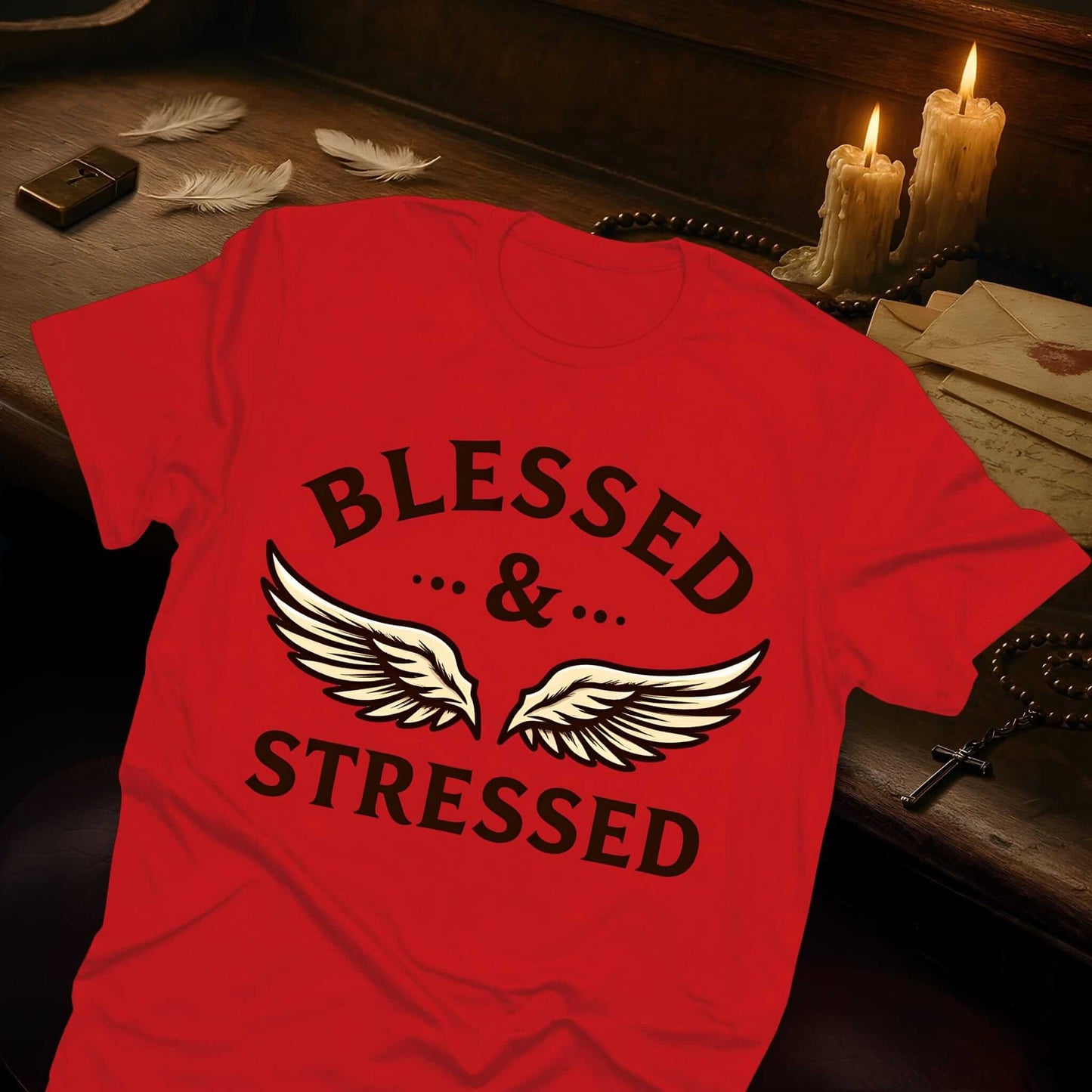 Vice & Tees' red t-shirt with "BLESSED & STRESSED" phrase in deep brown font complemented by stylized feathered wing graphics