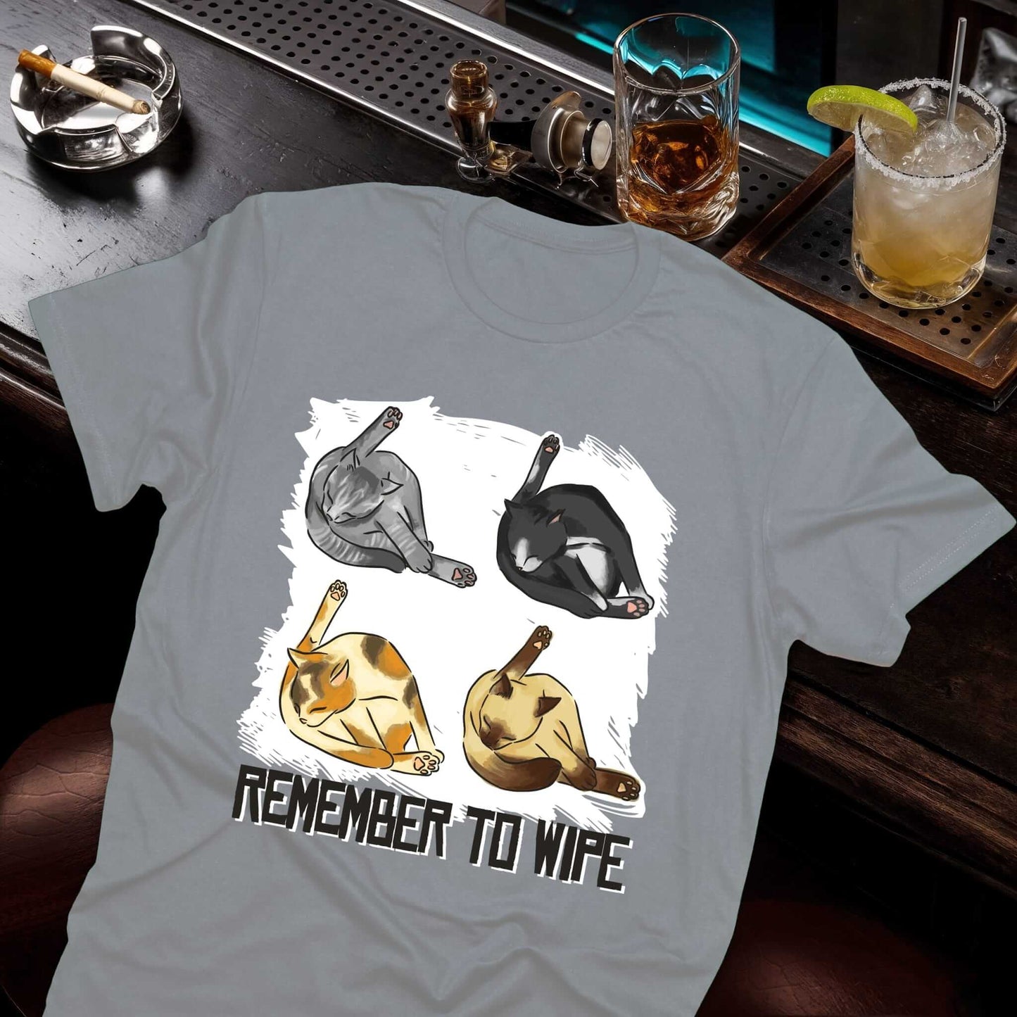 Four colorful classic cats showing grooming behavior in artistic cartoon style on gray tee, Midnight Mischief collection
