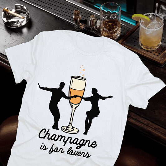 White t-shirt featuring "Champagne is for lovers" slogan and bubbly glass with romantic dancing figures