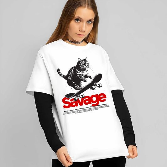 A black and white striped tabby cat riding a skateboard in a dynamic action pose with urban street art styling on white tee.