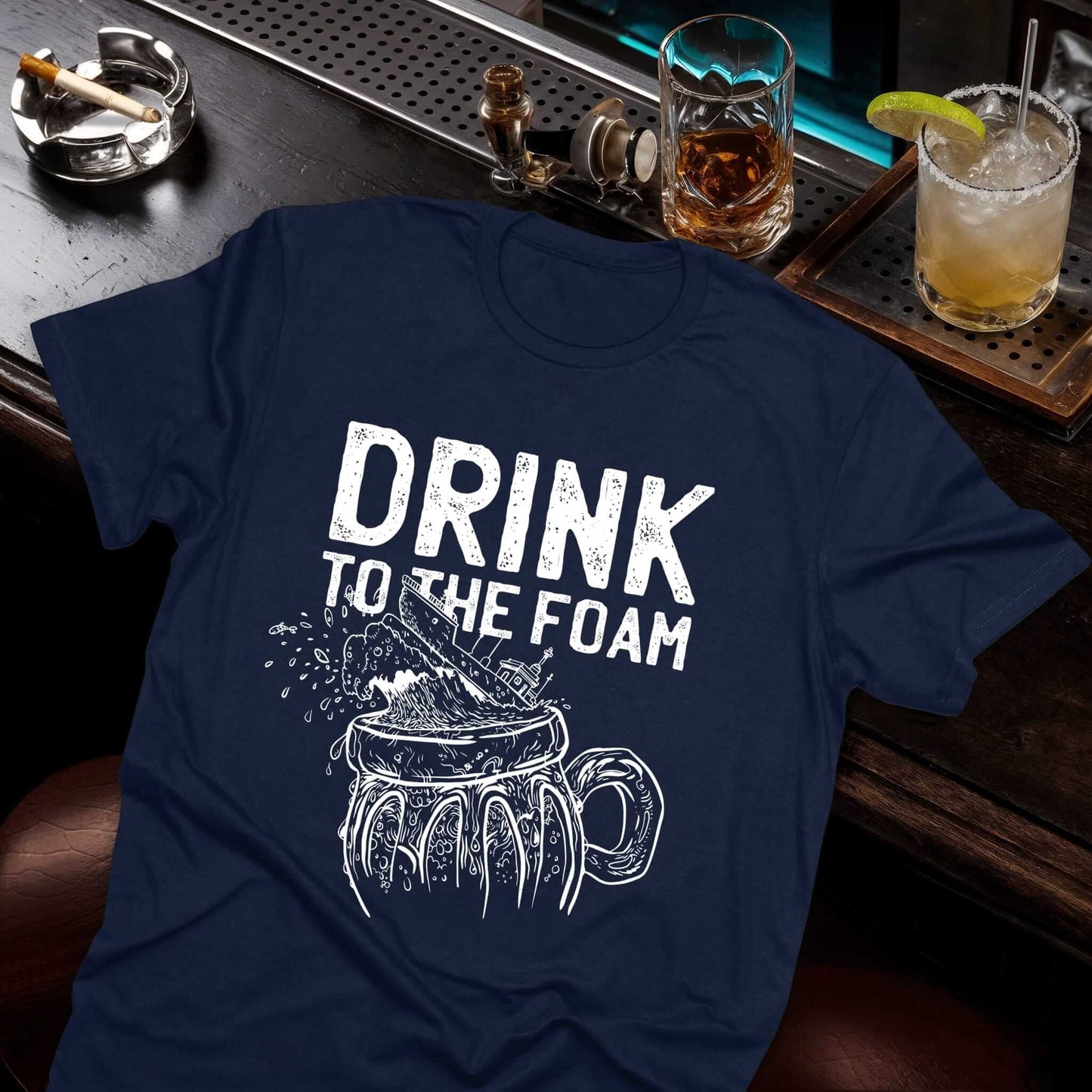 Beer-themed t-shirt with bold "Drink to the Foam" message, vintage-style foamy beer mug graphic, Midnight Mischief collection