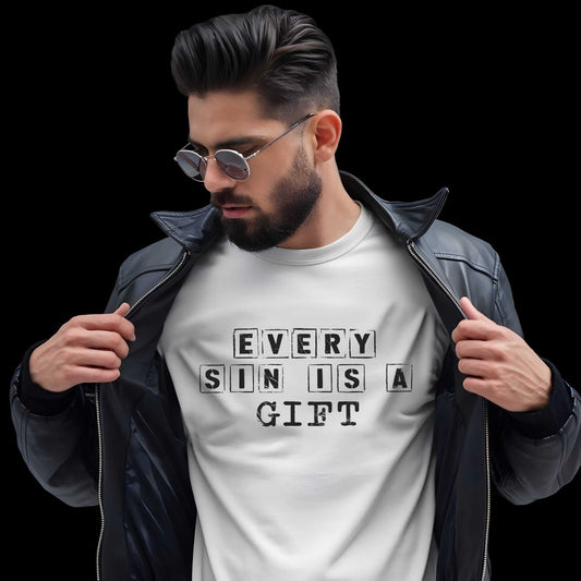 "Every Sin Is a Gift" text in black letter blocks arranged in intersecting horizontal and vertical lines on a white t-shirt