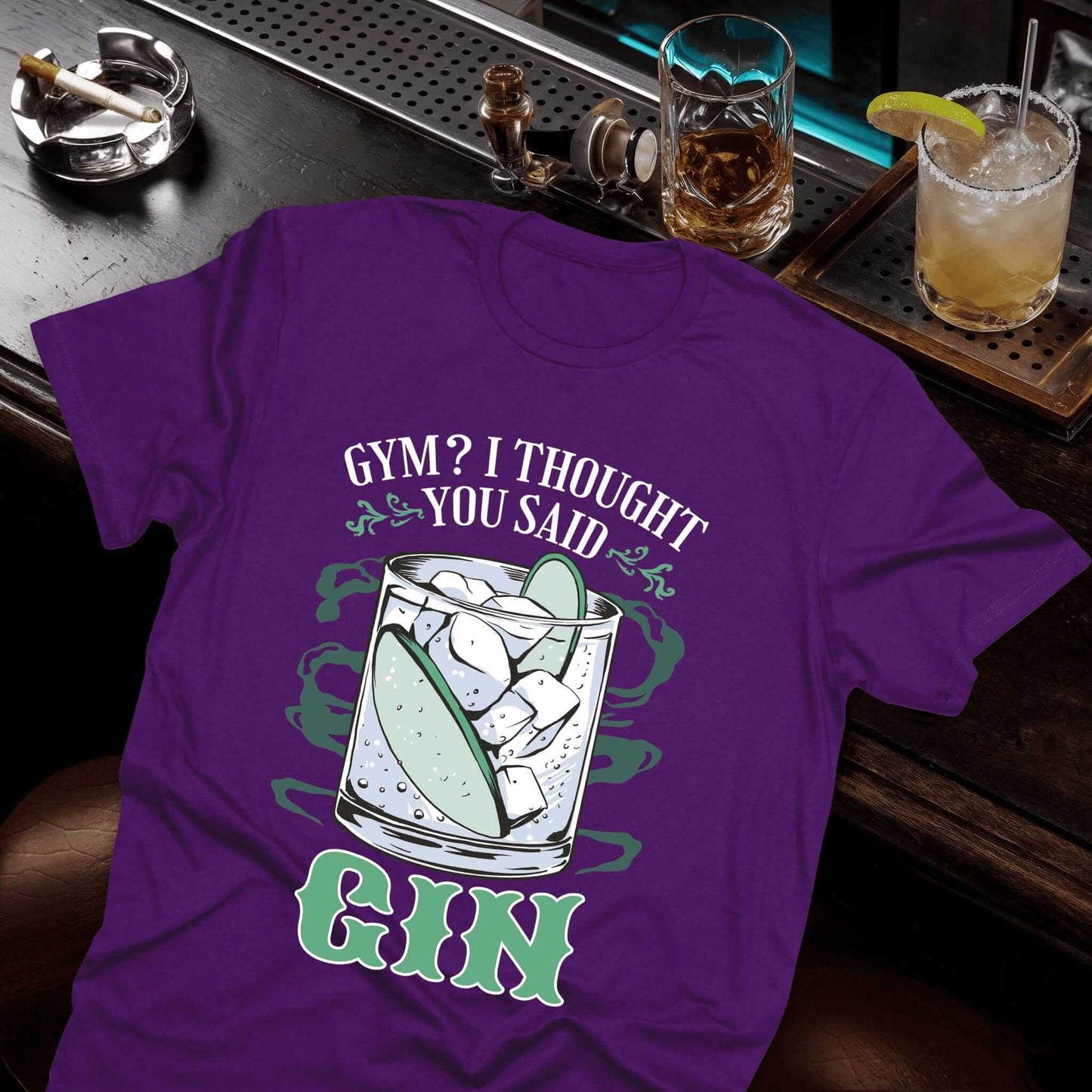 Vice and Tees purple t-shirt with gin cocktail graphic and "Gym? I Thought You Said Gin" drinking humor text