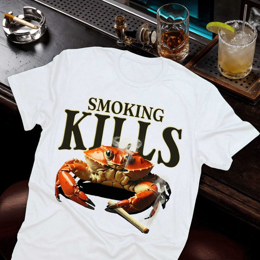 Detailed orange-red crab gripping lit cigarette beneath SMOKING KILLS typography in olive green font on cotton white t-shirt