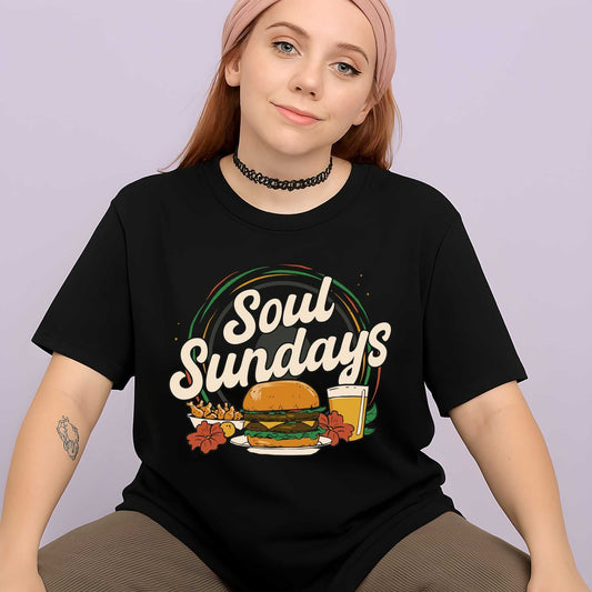 Soul Sundays retro script text with juicy burger, golden fries, foamy beer glass, rainbow arc, hibiscus flowers on black tee.