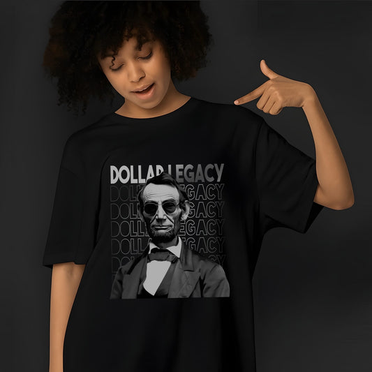 Black t-shirt featuring Abraham Lincoln portrait with sunglasses and bold "DOLLAR LEGACY" text in white lettering design