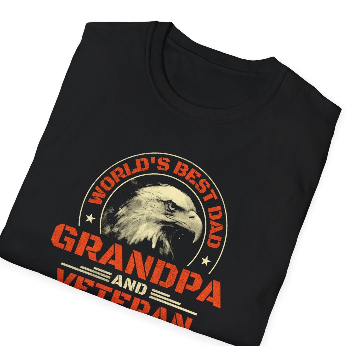 Black t-shirt displaying circular eagle emblem with "World's Best Dad" arc text above and "Grandpa and Veteran" below in orange